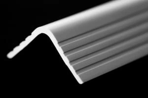 an angled plastic extrusion in white