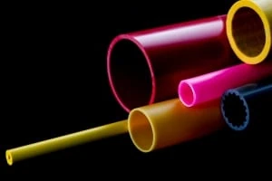 pink and yellow coloured rigid plastic tubes